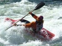 whitewater playboater at the American River Festival