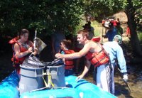 unloading trash from the rafts